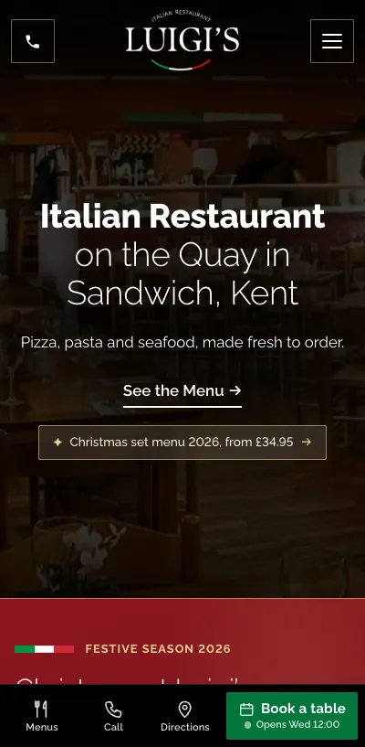 Luigi’s Italian restaurant website on a phone: Italian Restaurant on the Quay in Sandwich, Kent, with a Book a table button in the bottom bar.